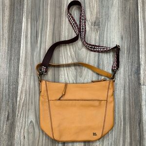 The Sak Tan Leather Crossbody Bag with Patterned Strap
